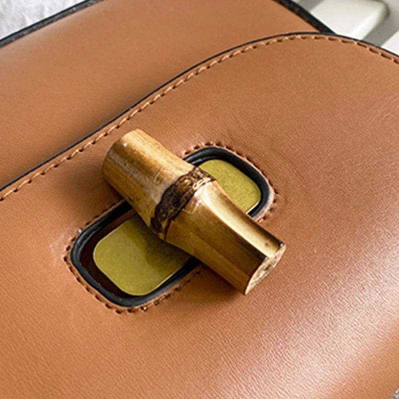Vintage Saddle Bag with Bamboo Handle Messenger Bag Leather Handbag Shoulder Bag Crossbody Bag Gift for Valentine's Day-AURA REGALIA 